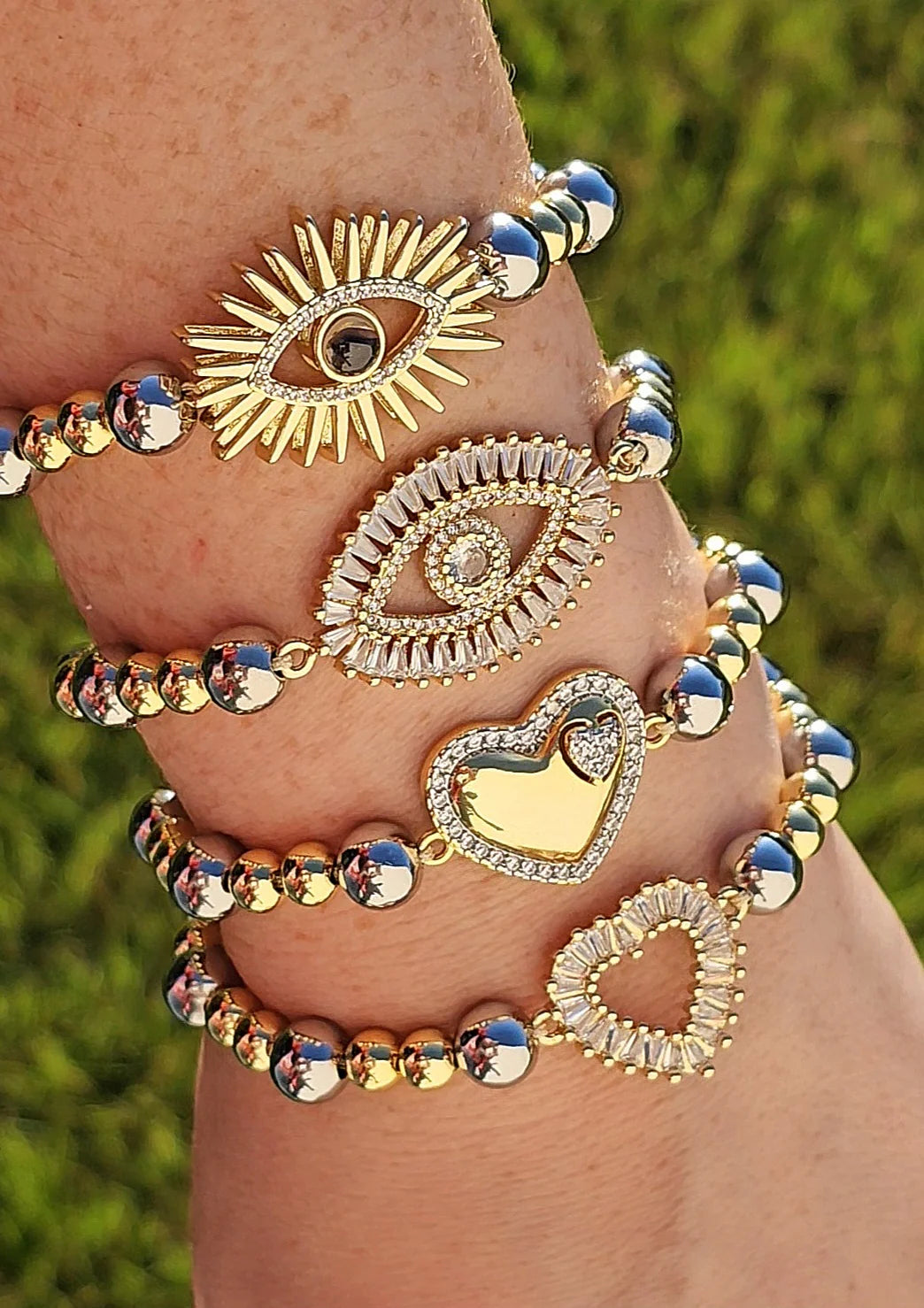 18k gold plated heart and evil eye bracelets
Clear baguette CZ