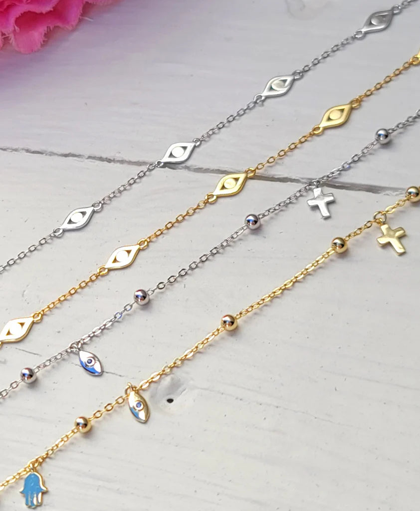 .925 Sterling silver evil eye and cross bracelets
