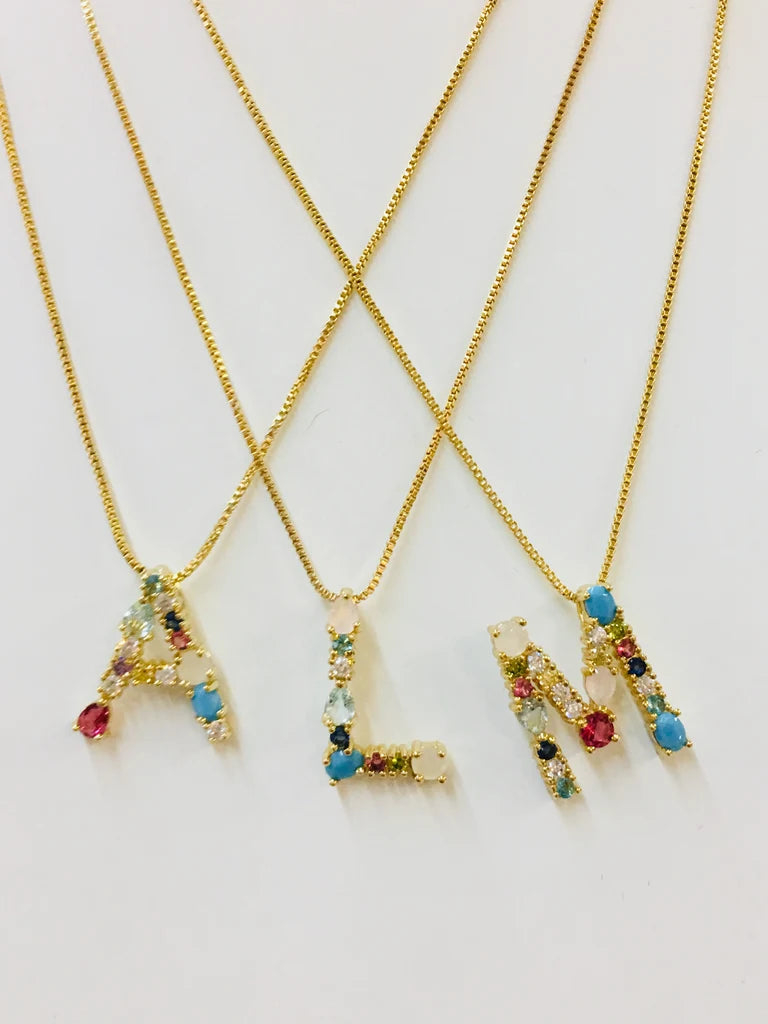 Rhodium plated rainbow initial necklaces