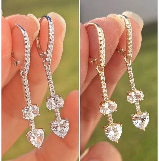 .925 Sterling silver dangling heart earrings