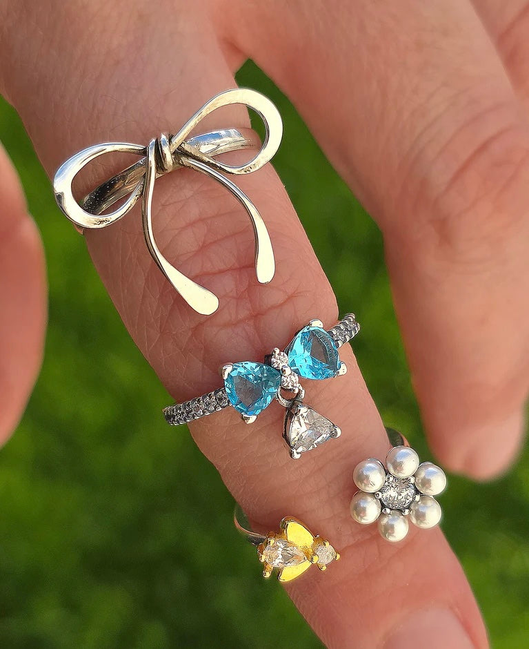 .925 sterling silver bow and pearl flower rings
