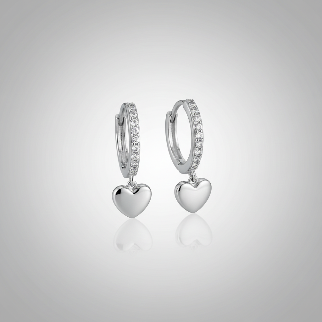 Dangling heart plateado